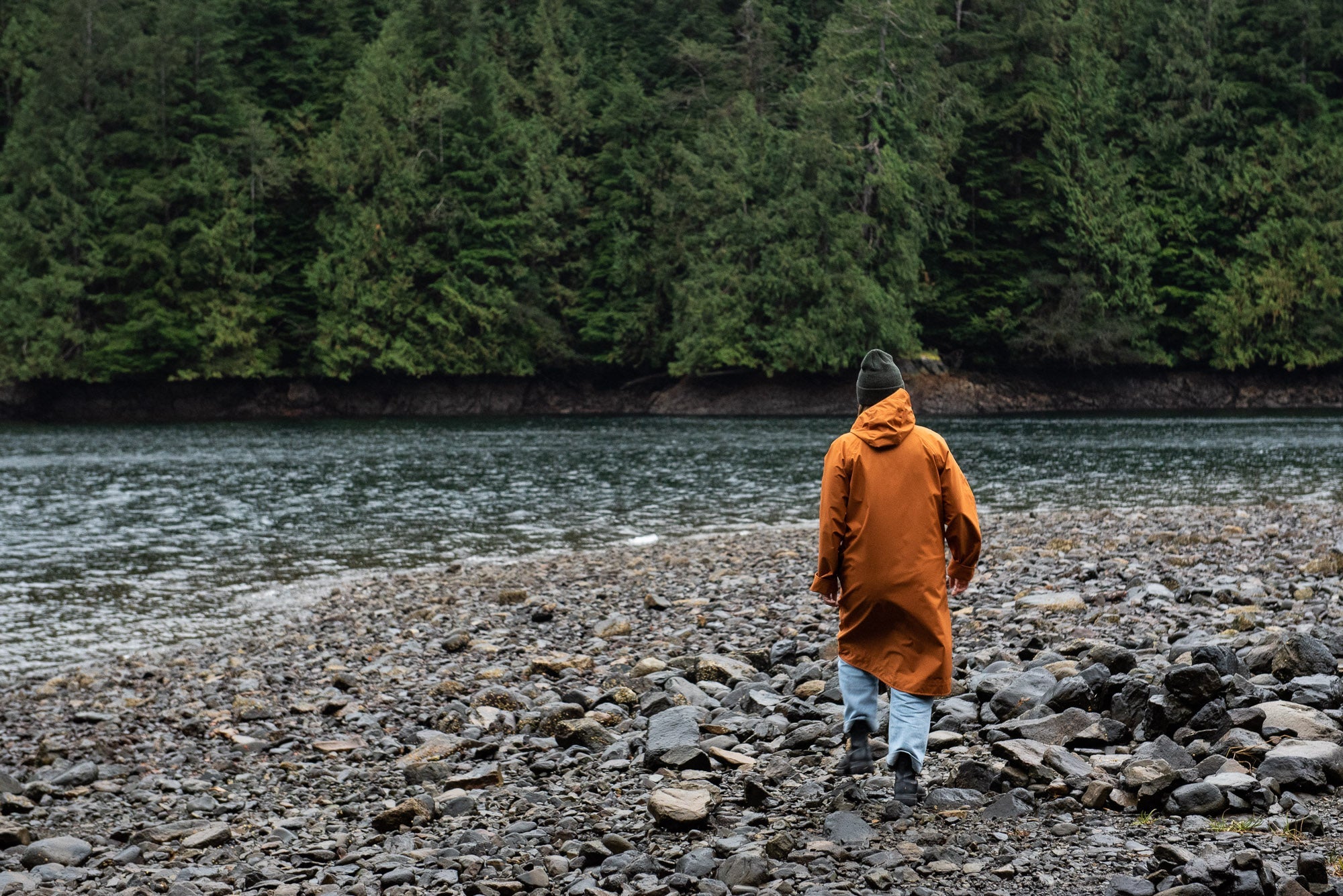 fairechild x nimmo bay raincoat on woman on the beach