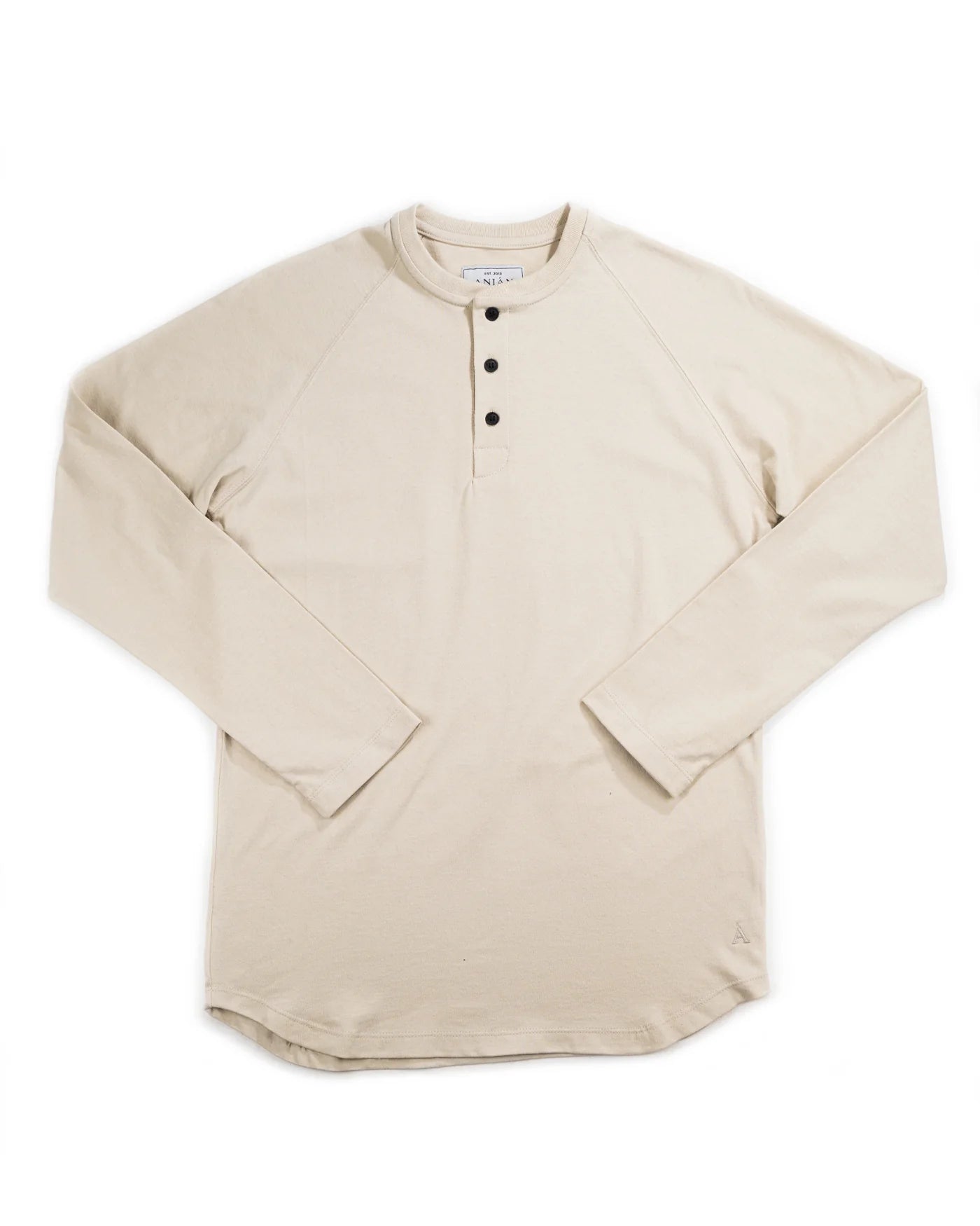 A pelican anian henley with three buttons and raglan sleeves