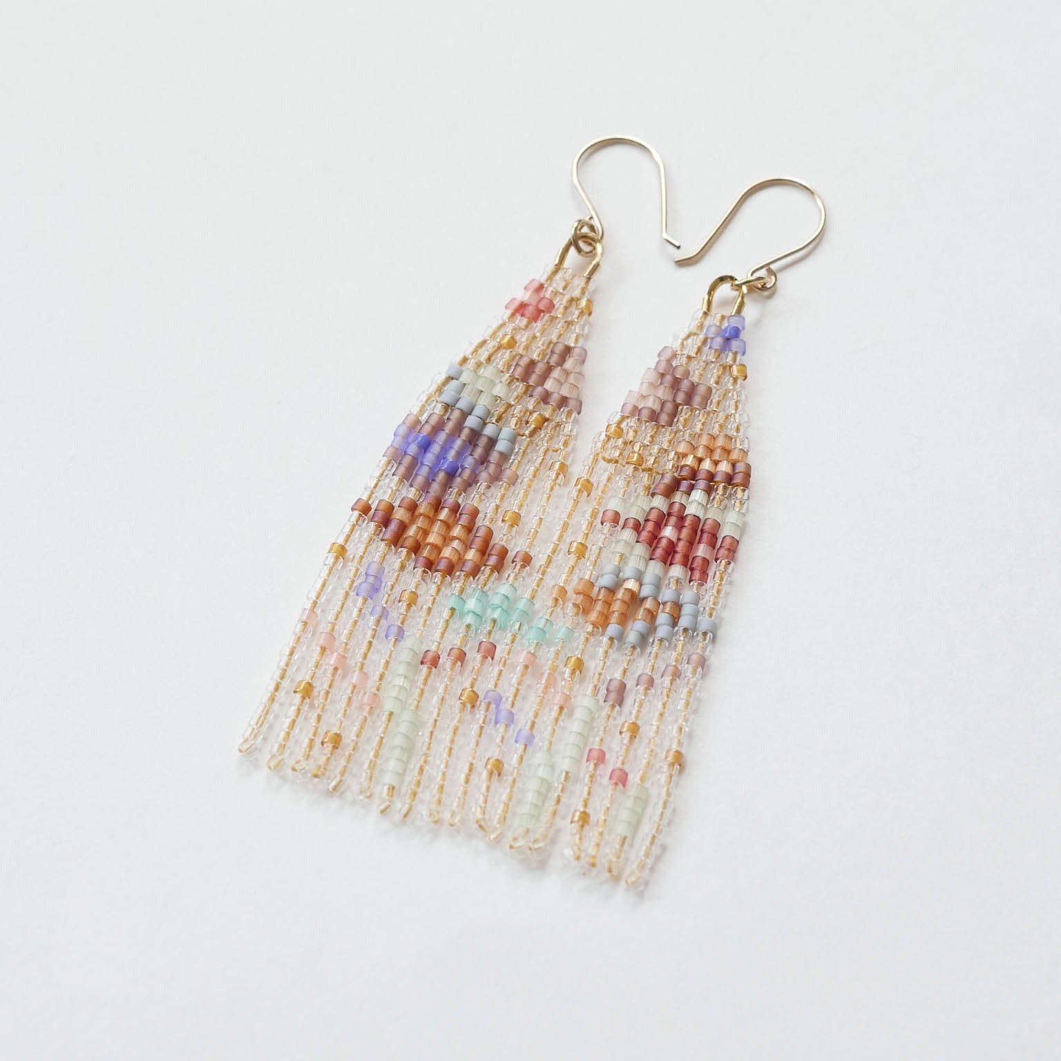 flatlay of daldanea collette beaded earrings