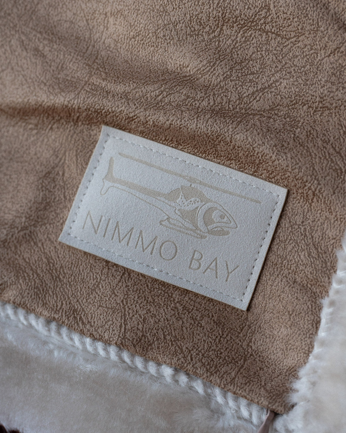 a nimmo bay boat blanket close up of the heli fish logo