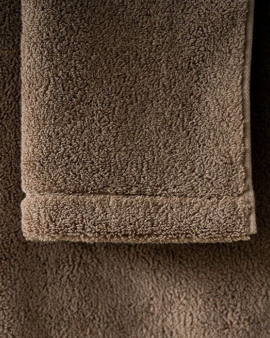 Close-up of a brown towel with a textured surface