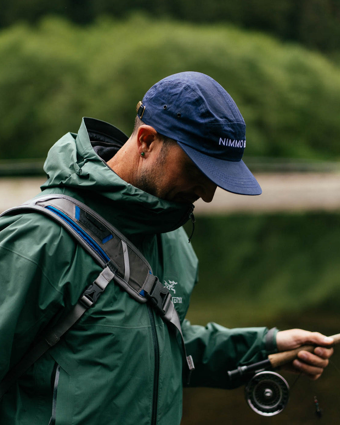 Man in the navy waxed tin cap from Anian