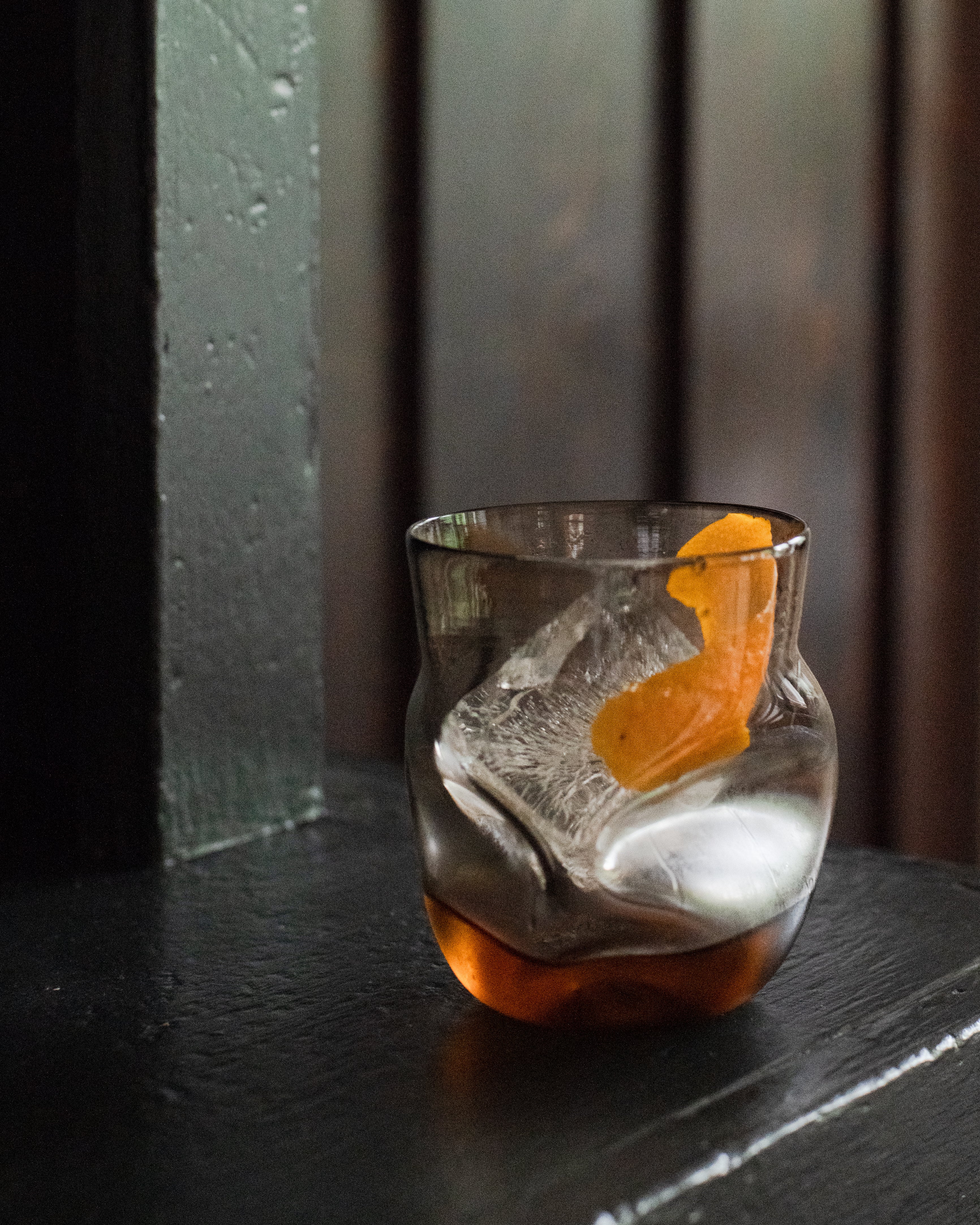 A single Goodbeast Crushed cup woth ice and an orange garnish