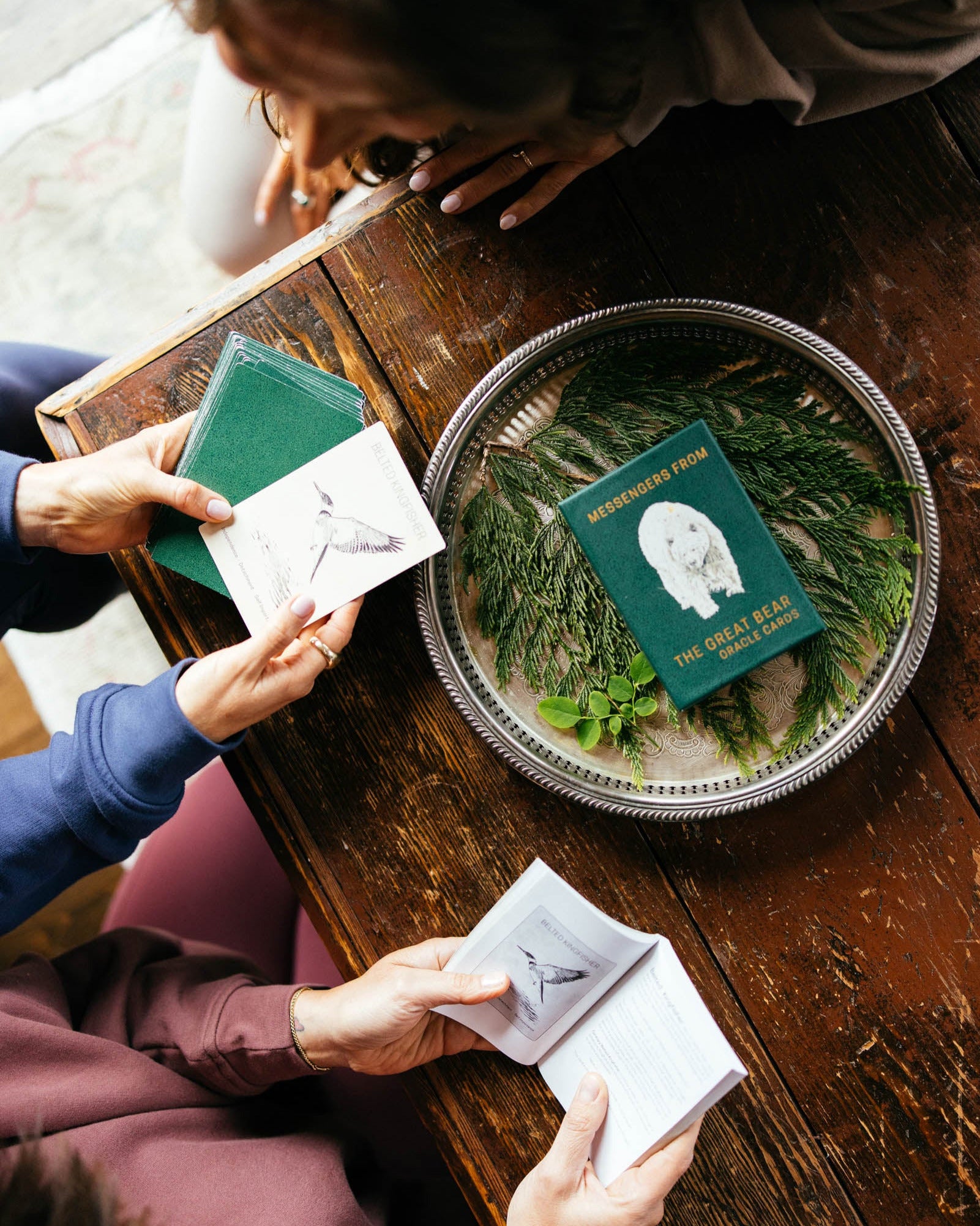 Women looking at oracle cards