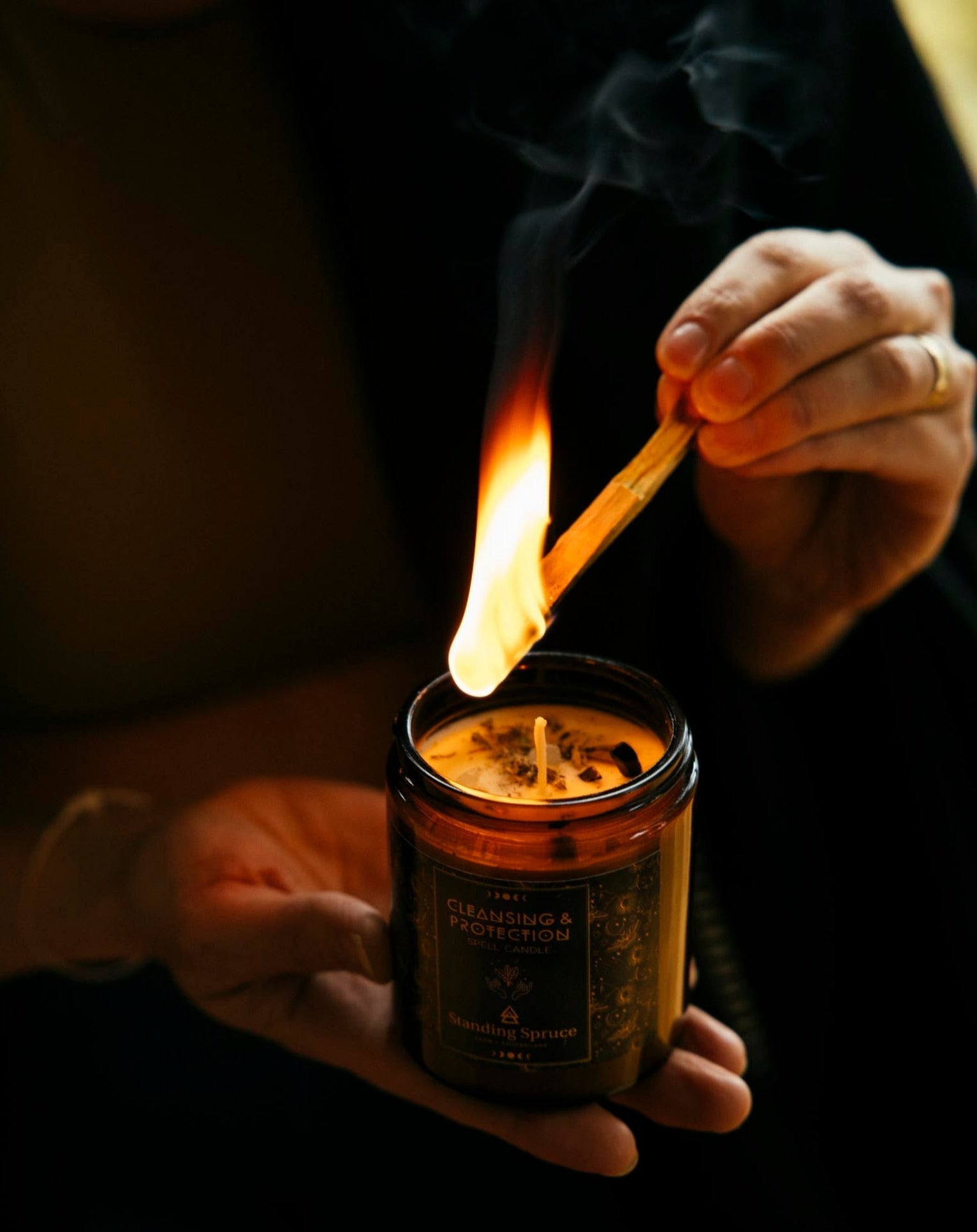 Spell Candle for Cleansing & Spiritual Protection being lit