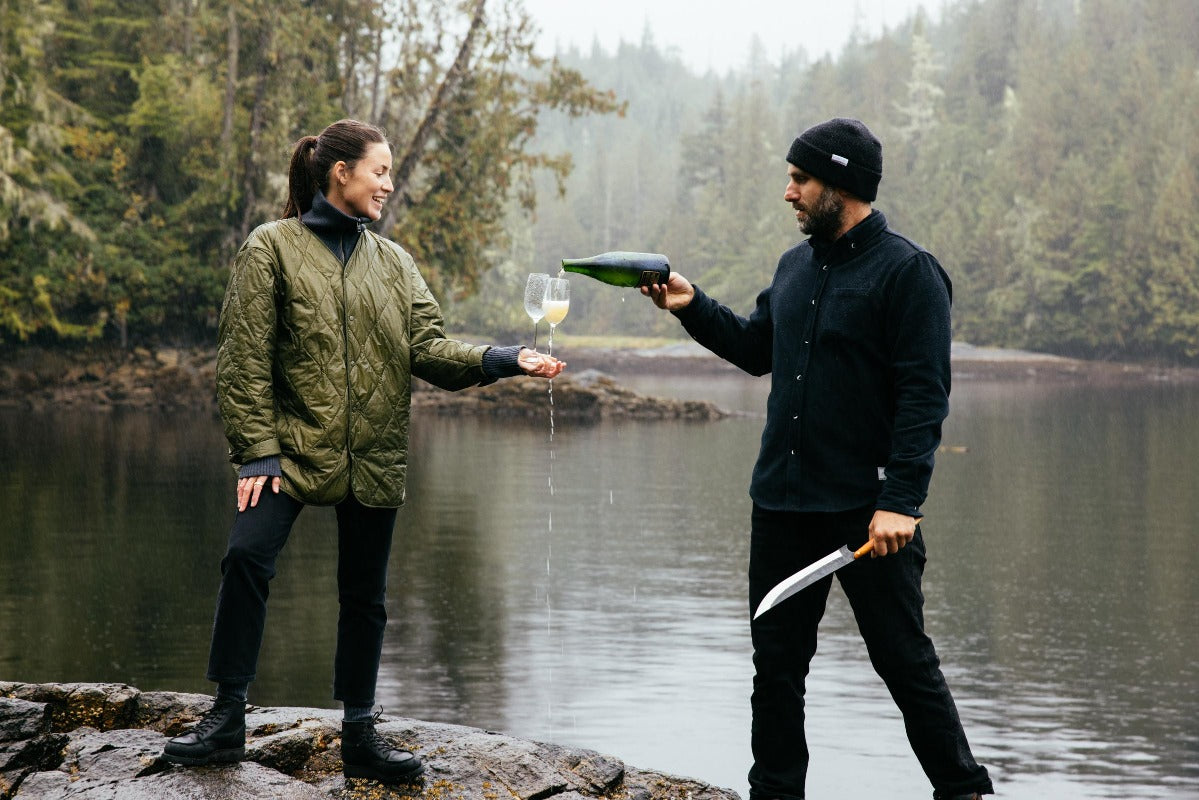 Pouring champagne at Nimmo Bay