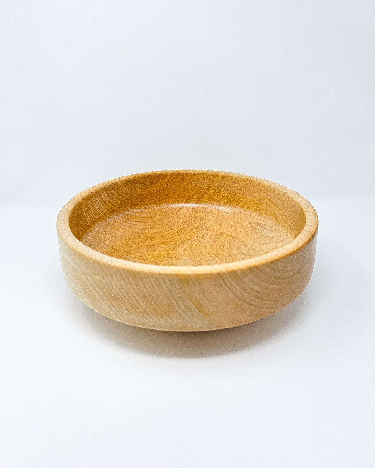 Miller + Co. Wooden Bowl #7 from the  side