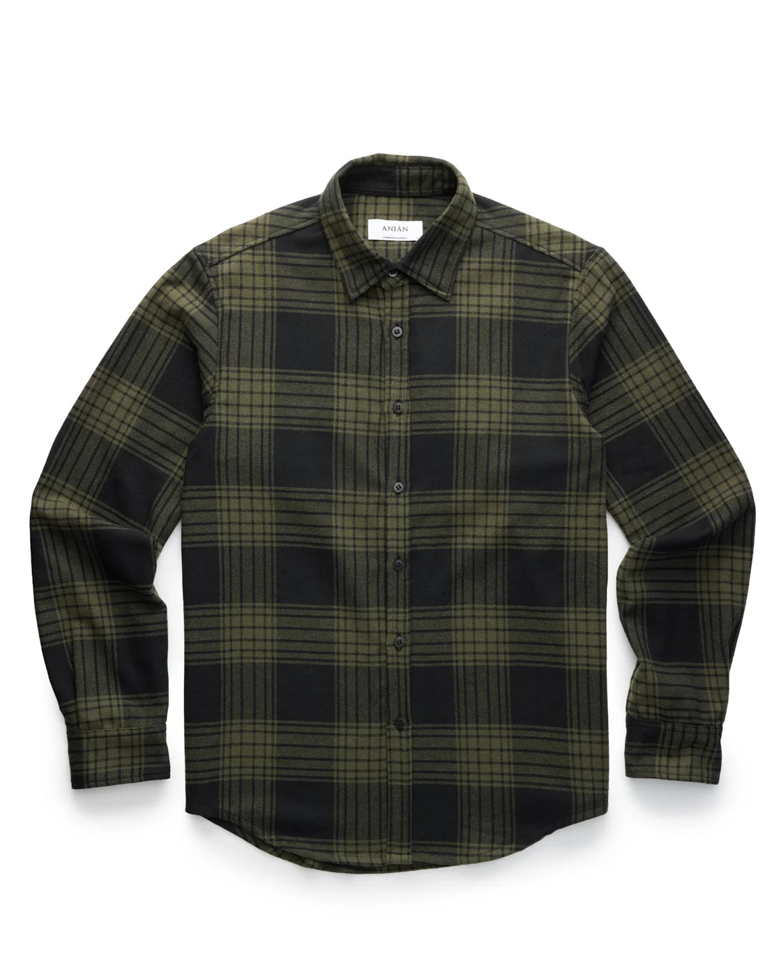 a flat lay of a green plaid flannel shirt