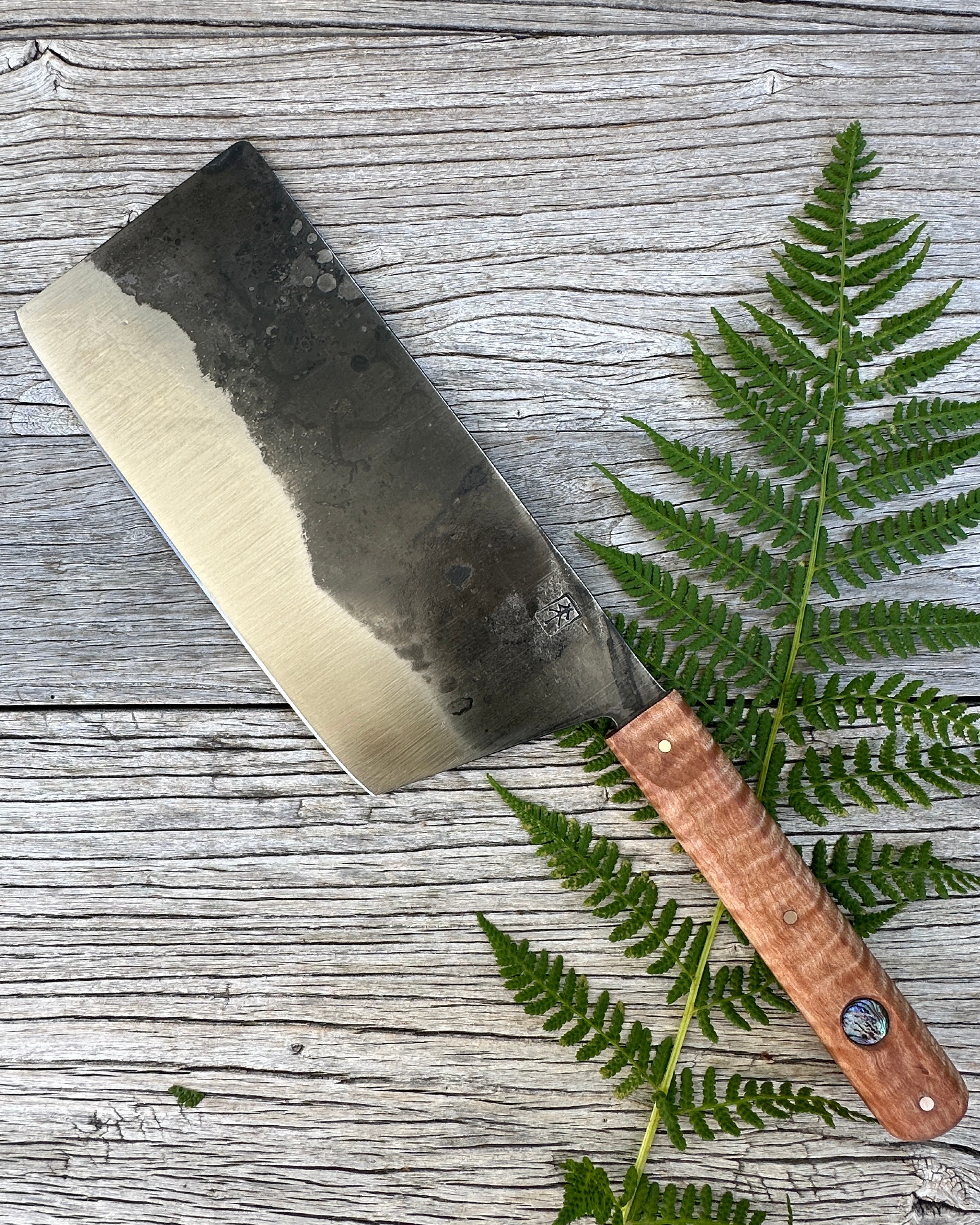 Leechtown Blacksmith Co. for Confluence Nimmo Bay knife on wood table