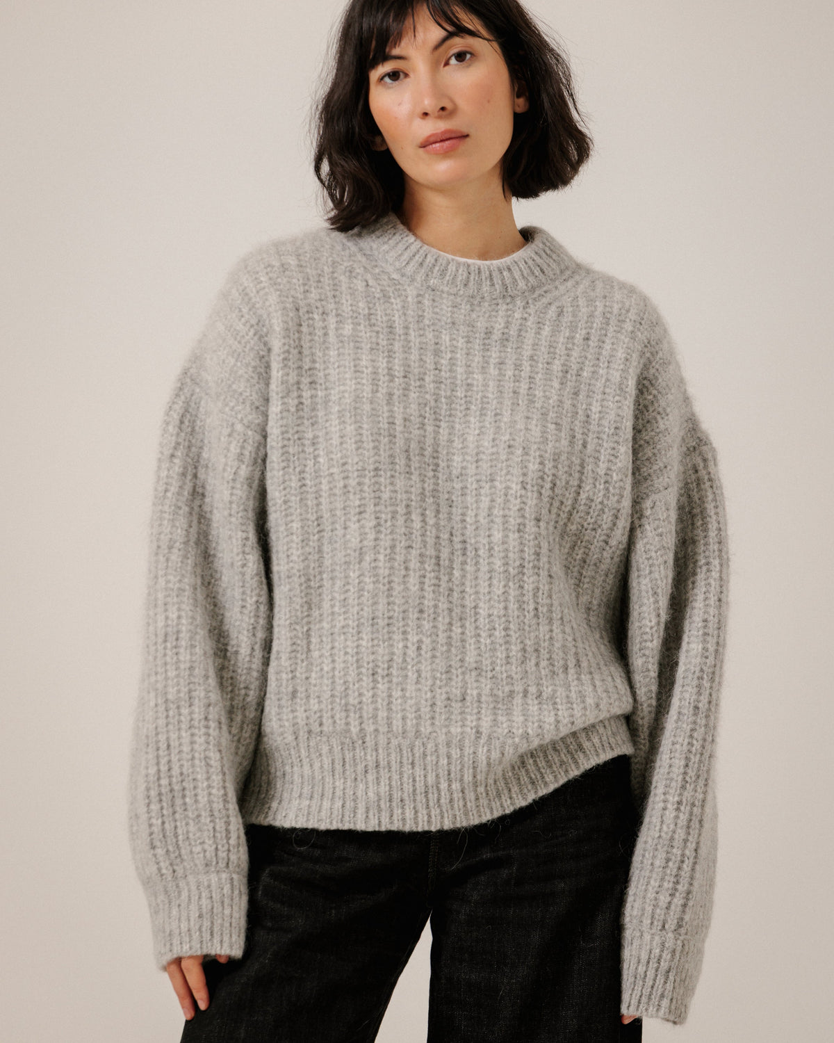 bare knitwear crewneck in grey on a woman