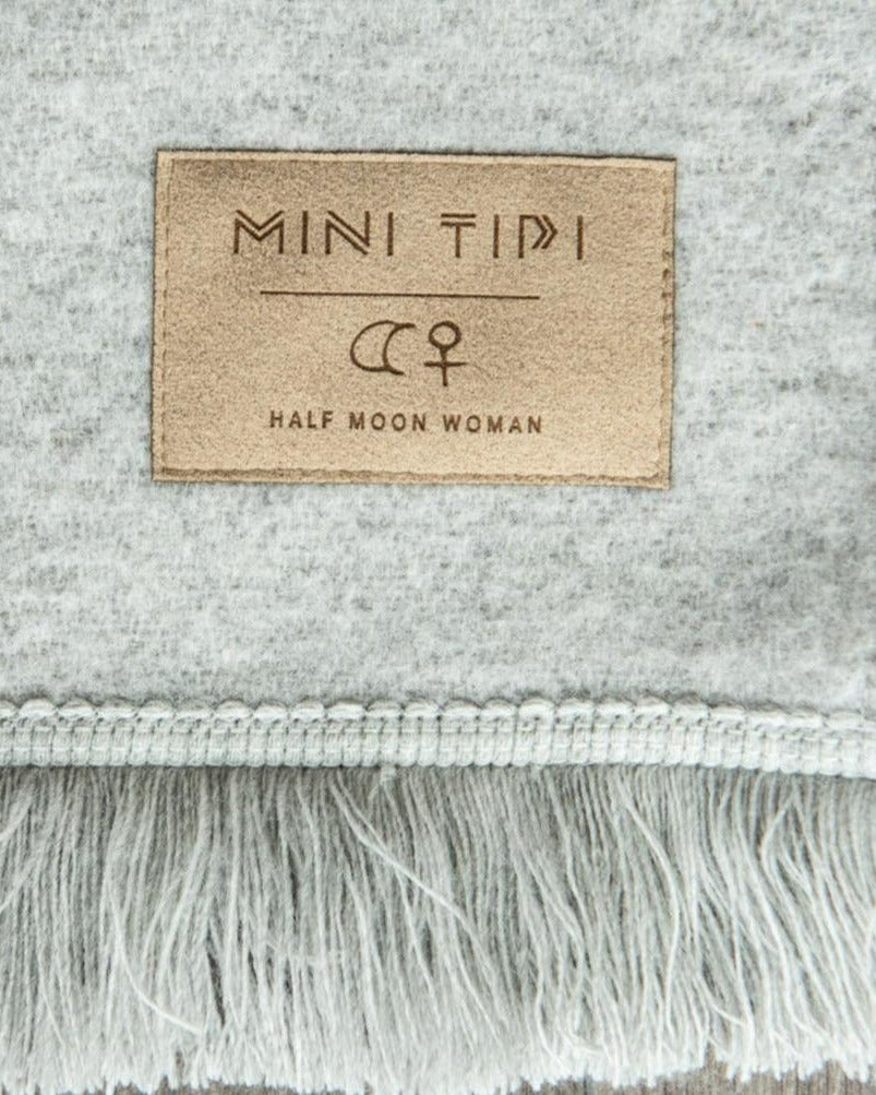 mini tipi eco-friendly everyday blanket in birch bark by half moon woman