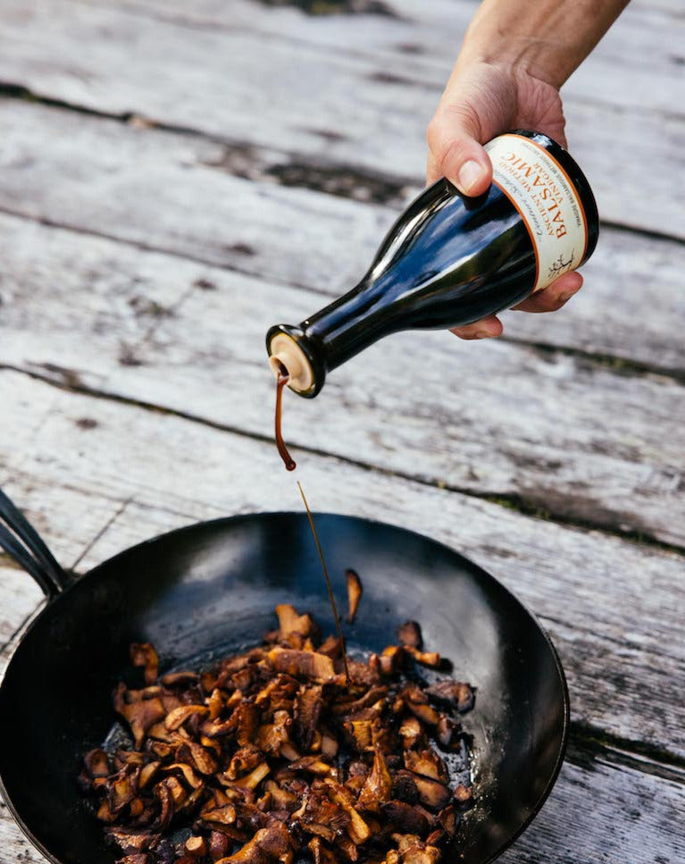 venturi schulze balsamic vinegar with chantrelle mushrooms in a pan